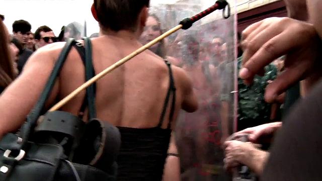 Public slutty MILF with estim on thighs whipped outdoors