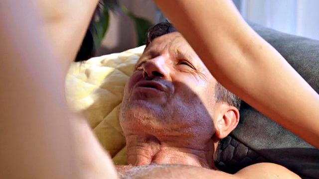 Romantic busty babe rides BFs cock under candles