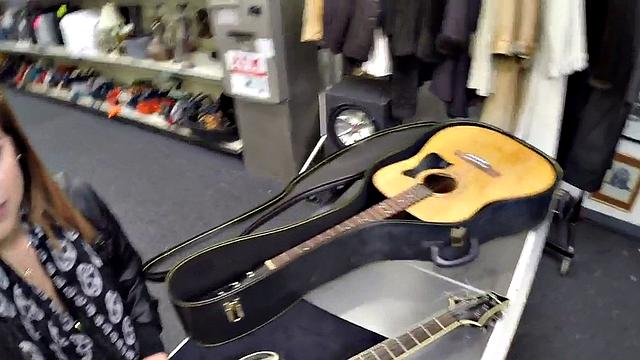 Pawnshop sexy customer enjoys sucking dick for a guitar