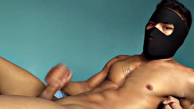 Not willing to identify, this young man with a gorgeous body and big cock asked to wear a mask for the shoot, then he used my dildo.