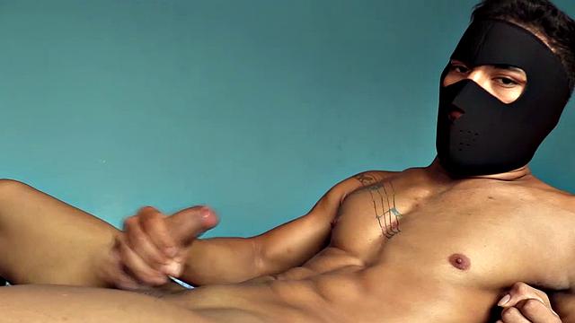 Not willing to identify, this young man with a gorgeous body and big cock asked to wear a mask for the shoot, then he used my dildo.