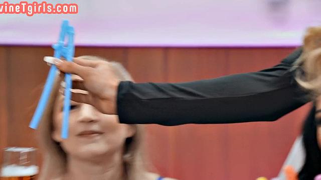 TS MILF fucks gloryhole sucking lady in restroom