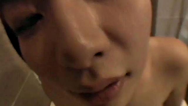 Bathing Asian teen sucks cock
