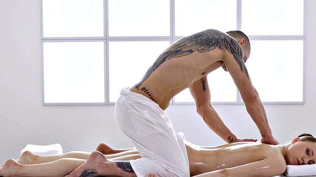 Watch this tattooed babe get her bald pussy pounded by a big white dick in reverse cowgirl