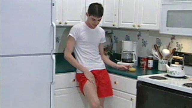 Cameron Kelley is a very cute and dark-haired 20-year-old with a nice 8.5-inch dick swinging between his legs. Once naked, he starts stroking his cock to a porn video and soon he's too busy concentrating on himself to watch the action.