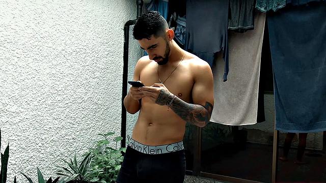 Already naked adn boned up, Belus is on all fours and ready to take Julian's stiff cock. His top slides in from behind and the long bareback begins.