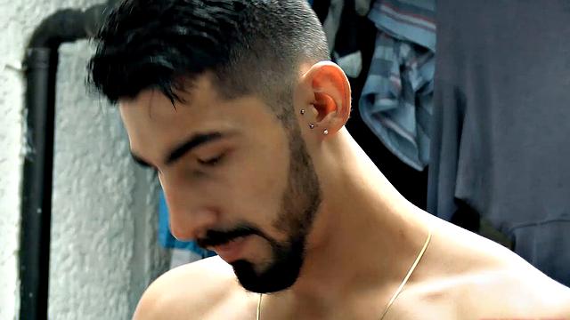 Already naked adn boned up, Belus is on all fours and ready to take Julian's stiff cock. His top slides in from behind and the long bareback begins.