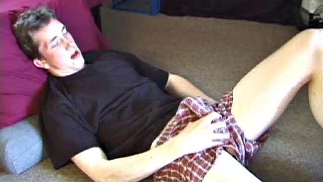 On the floor of his room Derek massages his crotch to himself. He soon pulls out his cock and strokes it until he cums on his stomach.