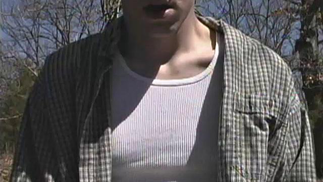 When 18 year old cutie Derrick Windsor is out hiking in the woods, he gets the urge to beat off. The young man looks around and sees he's alone, so he leans on a fallen tree and pulls his pants down just enough to work his growing cock.