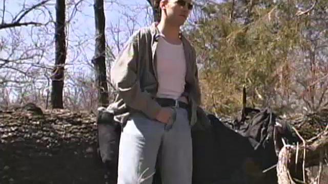 When 18 year old cutie Derrick Windsor is out hiking in the woods, he gets the urge to beat off. The young man looks around and sees he's alone, so he leans on a fallen tree and pulls his pants down just enough to work his growing cock.