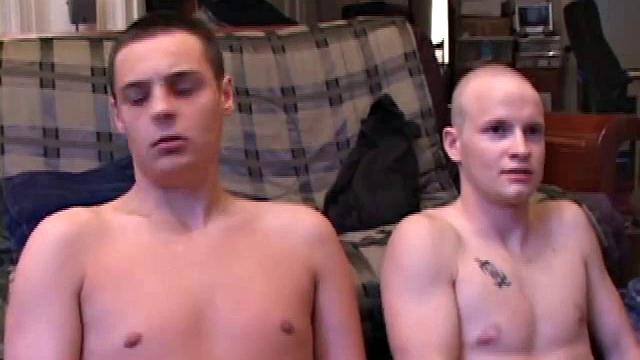 Buddies Lex and Gunner have sent their girls away for the weekend and are eager to spend some time together. The guys sit side-by-side, watching a porn video, and commenting on the show in front of them, while rubbing their growing dicks.
