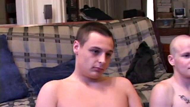 Buddies Lex and Gunner have sent their girls away for the weekend and are eager to spend some time together. The guys sit side-by-side, watching a porn video, and commenting on the show in front of them, while rubbing their growing dicks.