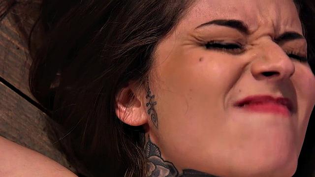 BDSM subject suffers in clothespins while pussyfingered