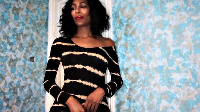 Busty black trans jerking off until cumming over tits