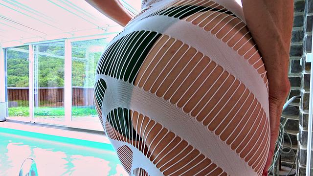 A red-hot 54-year-old's tiny bikini and pussy show