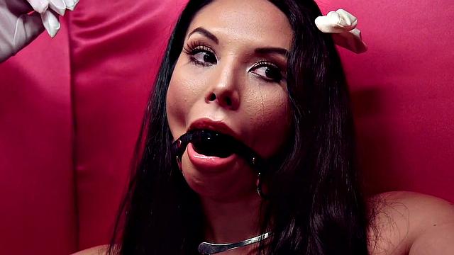 Big latex lezdom facesits her sub and licks her feet