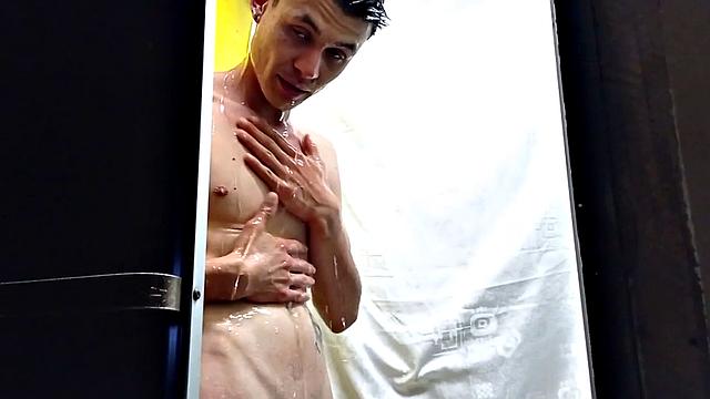 We look in on Dominic taking a shower. As the water cascades down his naked self, the young Latino works up a boner. Once hard, he starts jerking off, while we enjoy a good view of his slim and smooth body.