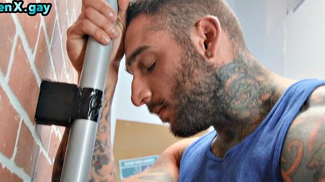 Manly police deepthroats inked stud from glory hole