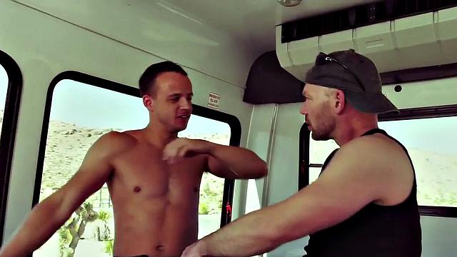 Bald stud gets his anal hole fisted in car duo