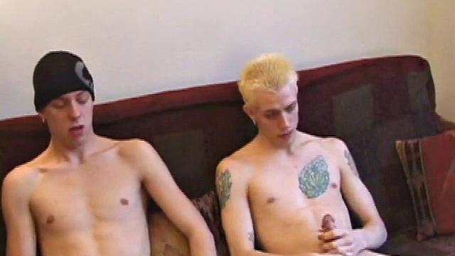 After they each work their bulge for a while, Roar is the first to lend a hand, and then a mouth. By the time they both strip and stroke side-by-side, Shane has already produced major leakage, before going down on Roar.