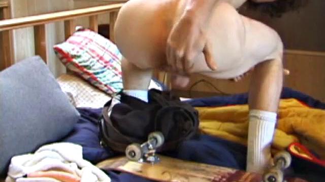 With skateboard at his side, this young street surfer wastes little time sliding down his pants and pulling out his rock hard cock from his boxers. Adam grabs a dildo, raises his legs into the air, and shoves it up his ass.