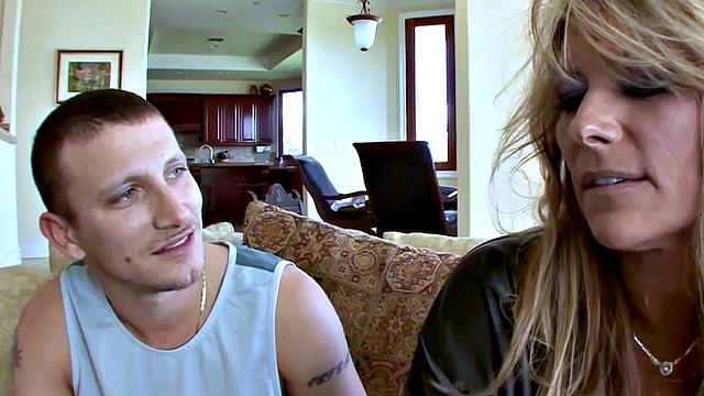 Blonde MILF gets her holes drilled in a wild gang bang until she swallows a load