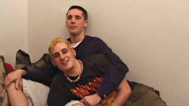 After they've stripped off their shirts, Torque kisses his way down Lance's torso. Lance kneels and Torque cups his balls while sucking his boy cock, which stiffens up pretty fast.