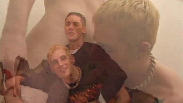 After they've stripped off their shirts, Torque kisses his way down Lance's torso. Lance kneels and Torque cups his balls while sucking his boy cock, which stiffens up pretty fast.