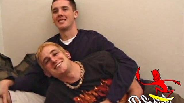 After they've stripped off their shirts, Torque kisses his way down Lance's torso. Lance kneels and Torque cups his balls while sucking his boy cock, which stiffens up pretty fast.