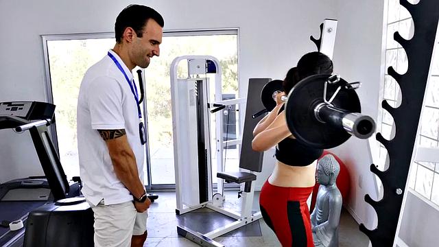 Nympho babe slammed by her gym trainer in doggystyle