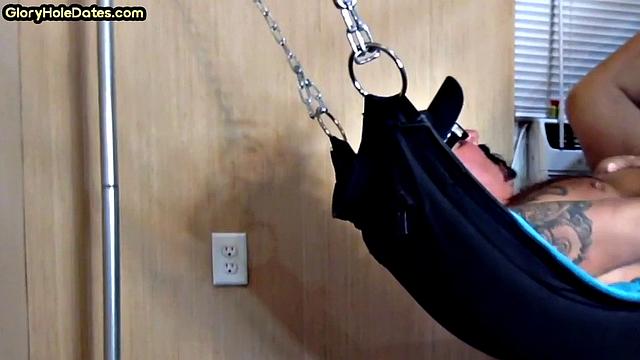 Tattooed daddy in sling gets fucked in ass at home