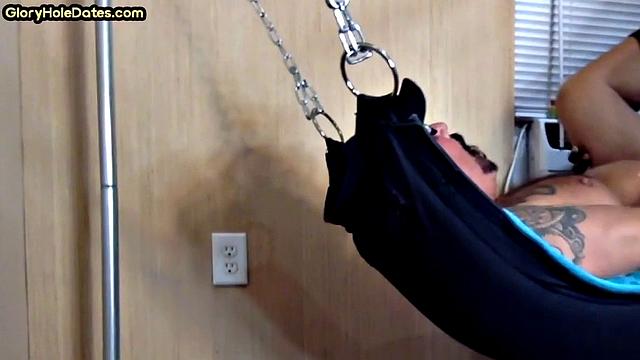 Tattooed daddy in sling gets fucked in ass at home