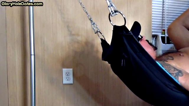 Tattooed daddy in sling gets fucked in ass at home