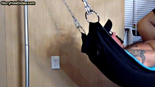 Tattooed daddy in sling gets fucked in ass at home