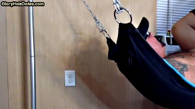 Tattooed daddy in sling gets fucked in ass at home