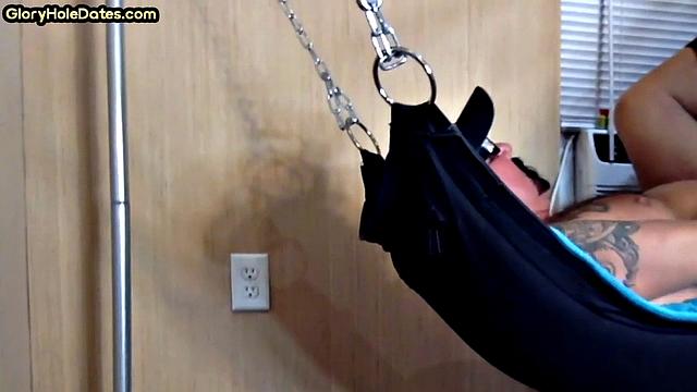 Tattooed daddy in sling gets fucked in ass at home