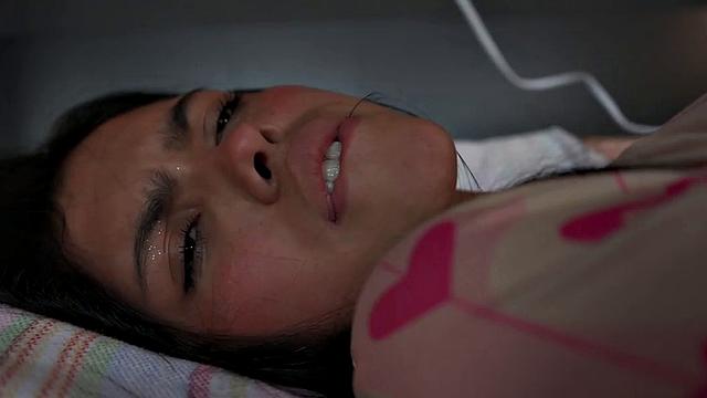 Lil Mia Holds the Vibrator with Shaved Pussy Closeup