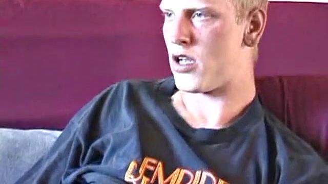 Freckled face Brandon invites us to watch him beat off, which really turns him on. The pants strip off and an anal toy goes in while he keeps stroking along through it all.