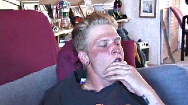 Freckled face Brandon invites us to watch him beat off, which really turns him on. The pants strip off and an anal toy goes in while he keeps stroking along through it all.