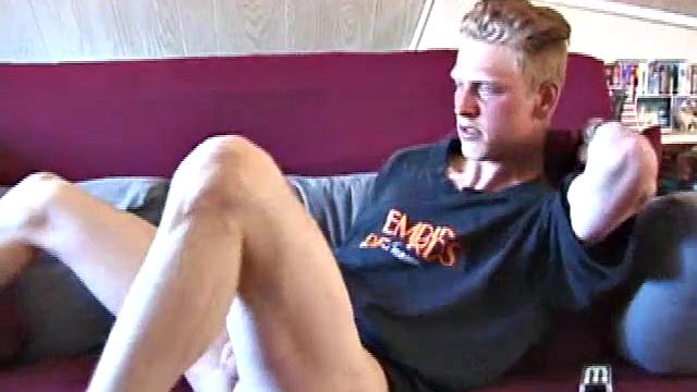 Freckled face Brandon invites us to watch him beat off, which really turns him on. The pants strip off and an anal toy goes in while he keeps stroking along through it all.