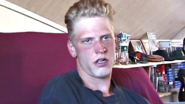 Freckled face Brandon invites us to watch him beat off, which really turns him on. The pants strip off and an anal toy goes in while he keeps stroking along through it all.