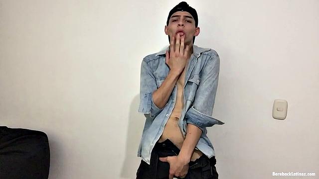 Paul leans against a wall, opens his shirt and pushes down his pants to reveal a skinny and smooth body and big uncut dick. Then he gives us a look at his little butt, while fingering himself, before stripping naked.