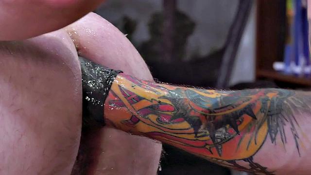 Analeaten bottom fingered and fisted by inked jock