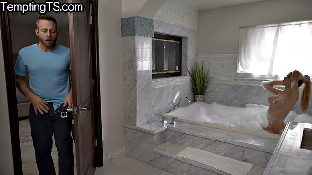 Blondie TS babe cockriding her lover