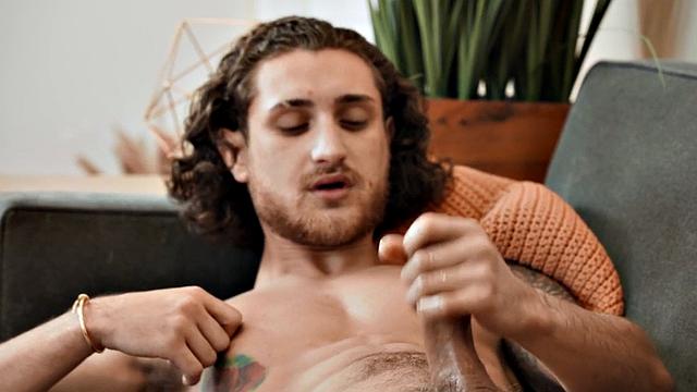 Solo inked eager jock wanks his cock with pleasure