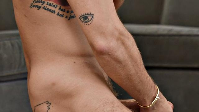 Solo inked eager jock wanks his cock with pleasure