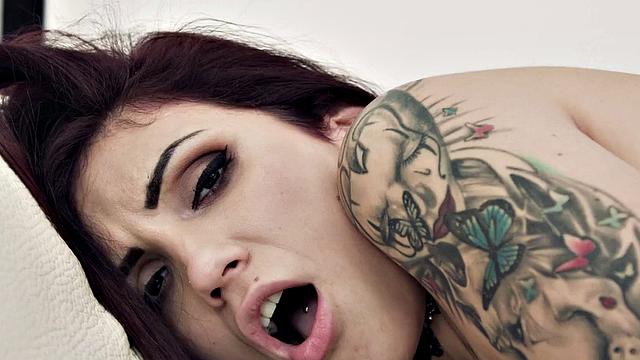 Kinky tattooed lesbians with big tits insert dildos up their pussies