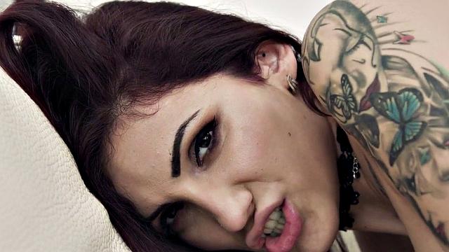 Kinky tattooed lesbians with big tits insert dildos up their pussies