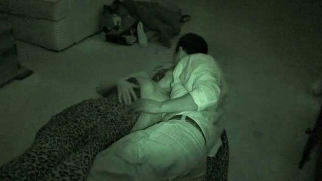 A hot brunette babe get nailed in the dark while being filmed with night vision cam