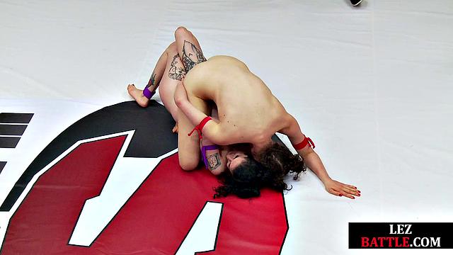 Amateur wrestler fingering her rival